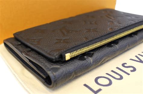 monogram empreinte leather wallet